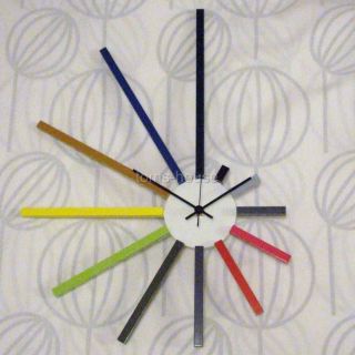   NO TICK, sweeping hand wall clock. Rainbow Cuisenaire designer