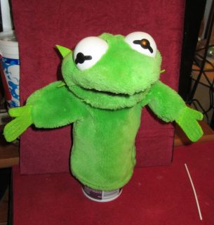 kermit the frog puppet in Muppets, Sesame Street