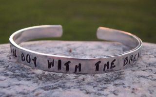 THE HUNGER GAMES HAND STAMPED THE BOY WITH THE BREAD CUFF BRACELET