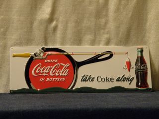 COCA COLA TIN SIGN FISHING EMBOSSED 19 X 6 1/2 THE REAL THING ROUNDED 
