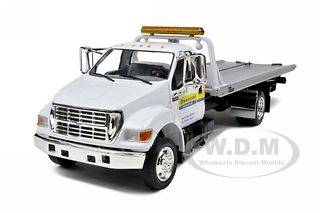 FORD F 650 FLAT BED TOW TRUCK NEW HOLLAND 1/34 BY FIRST GEAR 19 3882