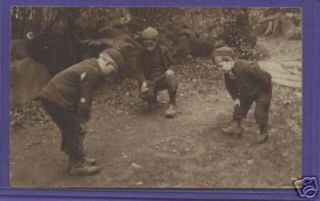 S4531 Photo postcard of children playing marbles