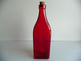 red glass bottle in Collectibles