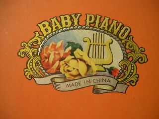 vintage toy piano in Other