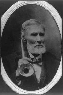 Zuber,c1900, holding ear trumpet to hear; aged 88