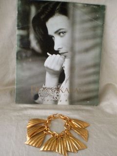   Signed Robert Lee Morris Donna Karan Gold Plate Shell Charm Bracelet