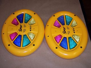 hand held handheld simon says 2 sided electronic game lot of 2