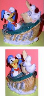 Disney Donald Duck Boat with a Pelican bank