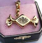 JUICY COUTURE Wrapped Caramel Candy Gold Bracelet Charm New in Box