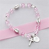 Find personalized First Communion jewelry including engraved rosaries 
