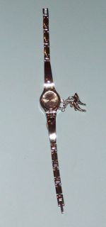 swanson ladies silver bracelet watch w 2 dolphin charms time