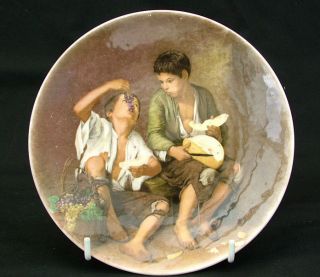 poole pottery plate beggar boys eating fruit location united kingdom
