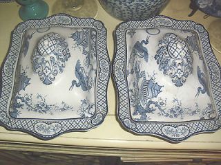 two wood sons orient covered serving pieces 