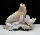   BABY BISQUE PORCELAIN WHITE SEAL POSED ON A SNOW COVERED ROCK FIGURINE