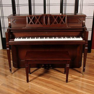 2011 story clark upright piano with matching bench sold by