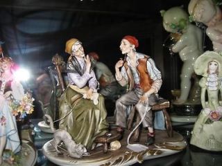 capodimonte jpa old man and woman with cat time left