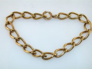   un marked gold filled link bracelet that is great for charms measures