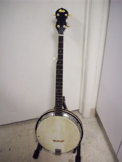 we have an old aida banjo with case it s old but i don t