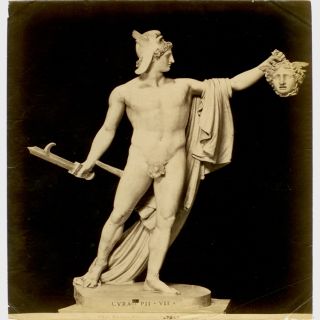holding the head of medusa by antonio canova within the vatican museum 