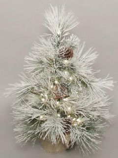 This mini rustic tree is plug in and has white classic lights.