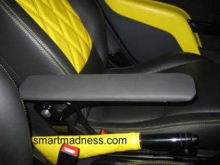 The armrest can be tilted all the way up between the seats when not in 