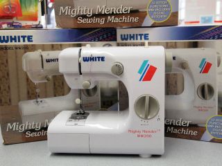 white mighty mender sewing machine  19 50