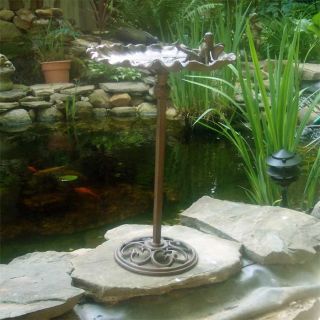 up for auction is a garden pixie fairy birdbath cast iron in a rust 