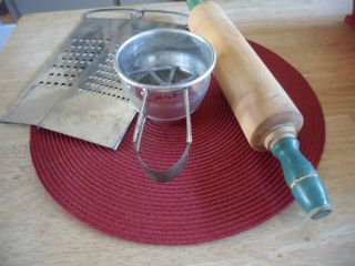   UTENSILS OLD ROLLING PIN, 2 HAND GRATERS BY BLUFFTON ,AND FOLEY SIFTER