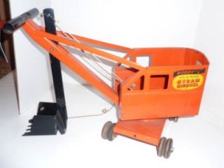 Up for auction is a great buddy l toy ride on steam shovel with wood 