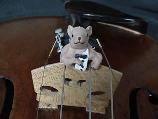 this auction includes genuine mouse tro mute cello all buyers