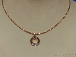 Movado Necklace with Diamond Pendant in 18K Yellow Gold