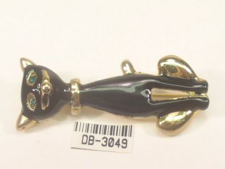 black enamel cat pin with green swarovski crystal eyes please visit