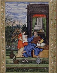 St. Matthew writing the Gospel with an angel holding the volume , an