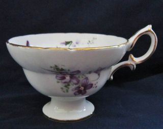 This is a bone china teacup and saucer set from Hammersley Victorian