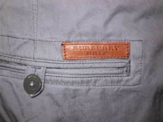 Burberrys essential chino in a slim fit, with double besom coin