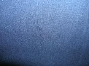 hard to see hem on bottom has loose stitching flaws