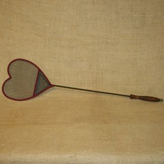 this fly swatter measures 23 3 4 inches long the heart measures 7