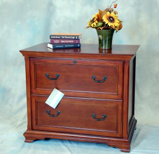 cherry lateral filing cabinet a warm cherry finish staight lines and