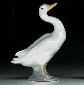 this is a beautiful hand painted figurine made by lladro spain with