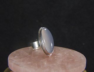  carats The ring is size 7 and set in heavy gage sterling. Thank you