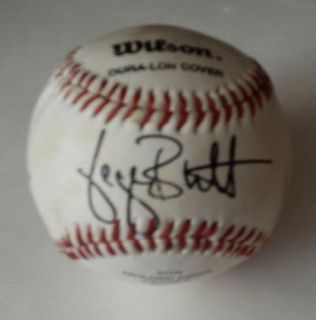 this is an original vintage george brett autographed baseball the