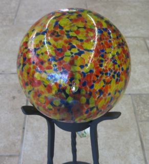 orange yellow and blue glass gazing globe by giftcraft
