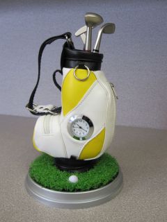  and White Golf Desk Clock & Pen Holder. Comes w/ Three Golf Club Pens