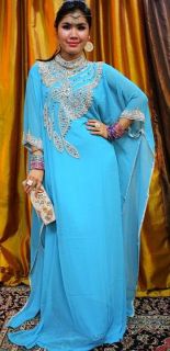  caftans are back hillary clinton s caftan and jessica simpson