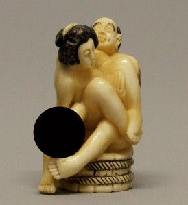 Japanese Okimono hand carved in the form of couple in a bathtub