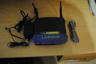 Linksys WCG200 54 Mbps 4 Port 10 100 Wireless G Router Cable Modem