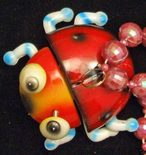 Bobble Head Lady Bug Mardi Gras Beads Moves Animated