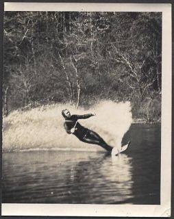 Photo Water Skiing Tricks Man in Wet Suit 637153
