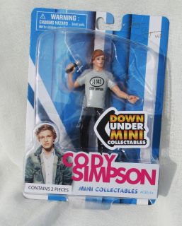 CODY SIMPSON DOWN UNDER 4 FIGURE W/ STAND IN 143 TEE SHIRT FOR AGE 6