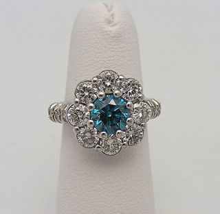 14k White Gold Flower Ring with 1 Rd Blue Dia. 1.02 ct. and 18 rbr
